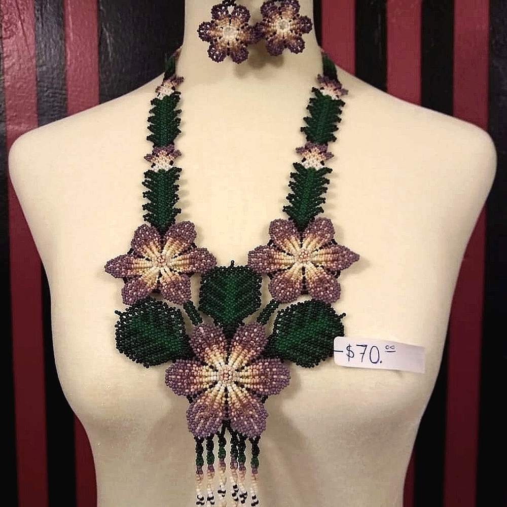 This is a beaded necklace with earrings